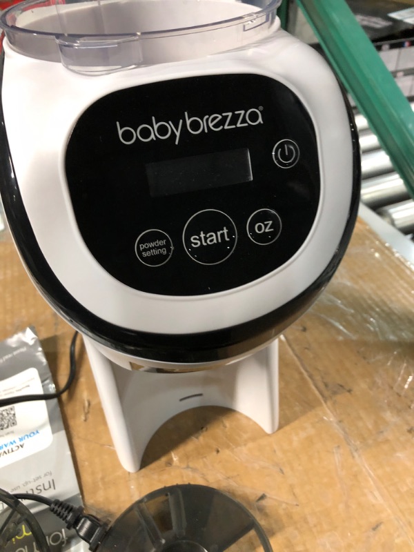 Photo 1 of Baby Brezza Formula Pro Mini Baby Formula Maker – Small Baby Formula Mixer Machine Fits Small Spaces and is Portable for Travel– Bottle Makers Makes The Perfect Bottle for Your Infant On The Go Formula Pro Mini Dispenser Machine