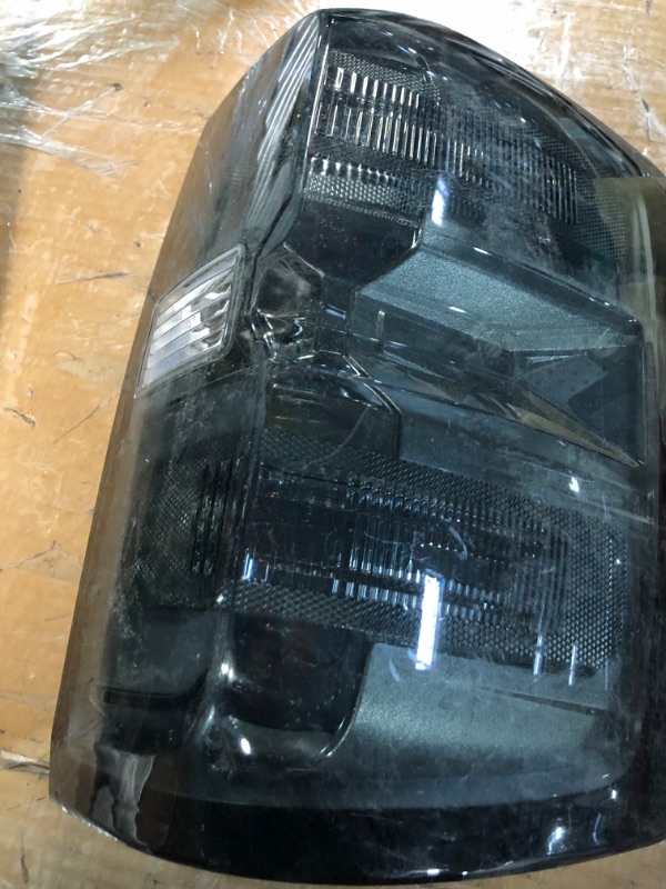 Photo 3 of **PARTS ONLY**NON REFUNDABLE NO RETURNS SOLD AS IS**
MAJOR SCRATCHES ON LENS
DWVO Tail Light Assembly