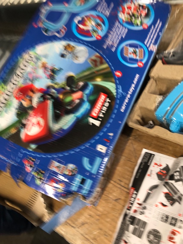 Photo 2 of **READ NOTES BELOW**Carrera First Nintendo Mario Kart Slot Car Race Track - Includes 2 Cars: Mario and Luigi and Two-Controllers - Battery-Powered Beginner Set for Kids Ages 3 Years and Up, 20063028 Mario Kart / Flippers