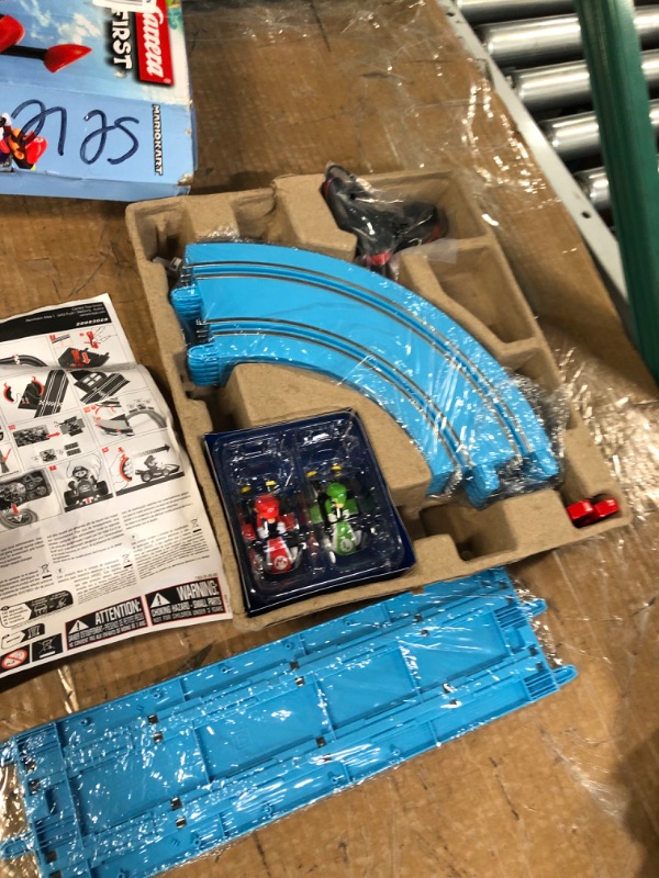 Photo 1 of Carrera First Nintendo Mario Kart Slot Car Race Track - Includes 2 Cars: Mario and Luigi and Two-Controllers - Battery-Powered Beginner Set for Kids Ages 3 Years and Up, 20063028 Mario Kart / Flippers