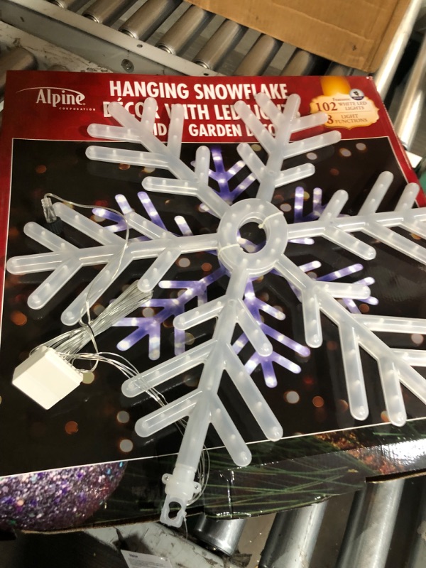 Photo 2 of **MISSING POWER CORD**
Alpine Corporation 24" Tall Hanging Snowflake with LED Lights