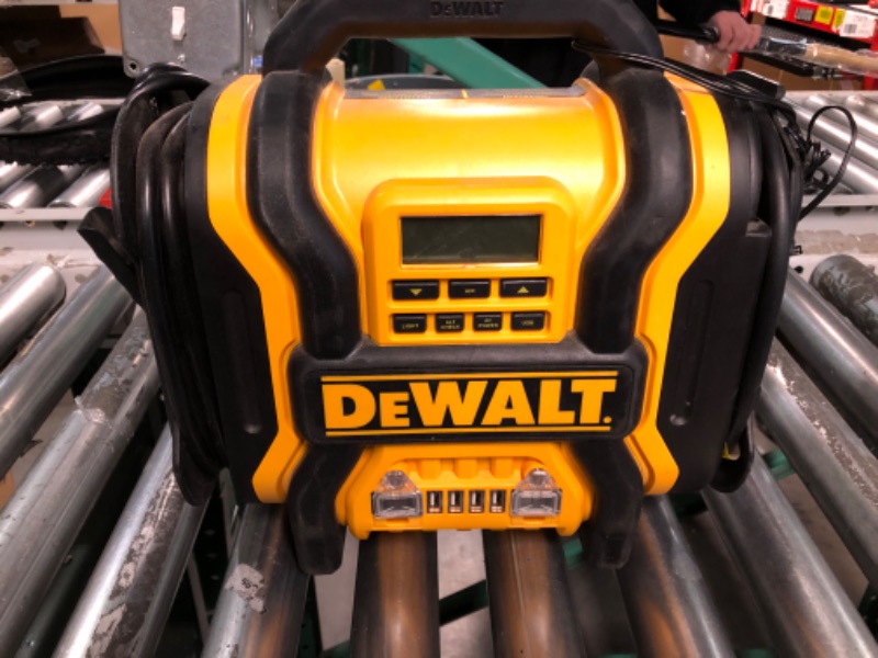 Photo 2 of DEWALT DXAEPS14 1600 Peak Battery Amp 12V Automotive Jump Starter/Power Station with 500 Watt AC Power Inverter, 120 PSI Digital Compressor, and USB Power , Yellow