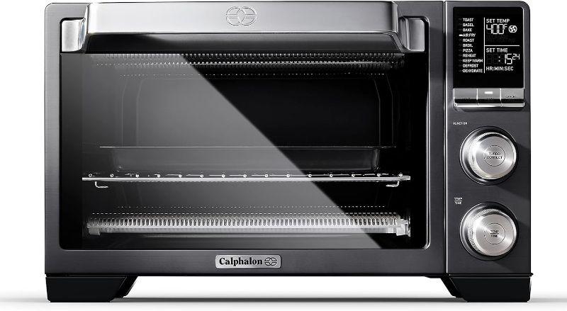 Photo 1 of ***USED - DIRTY - POWERS ON - UNABLE TO TEST FURTHER***
Calphalon Quartz Heat Countertop Toaster Oven,