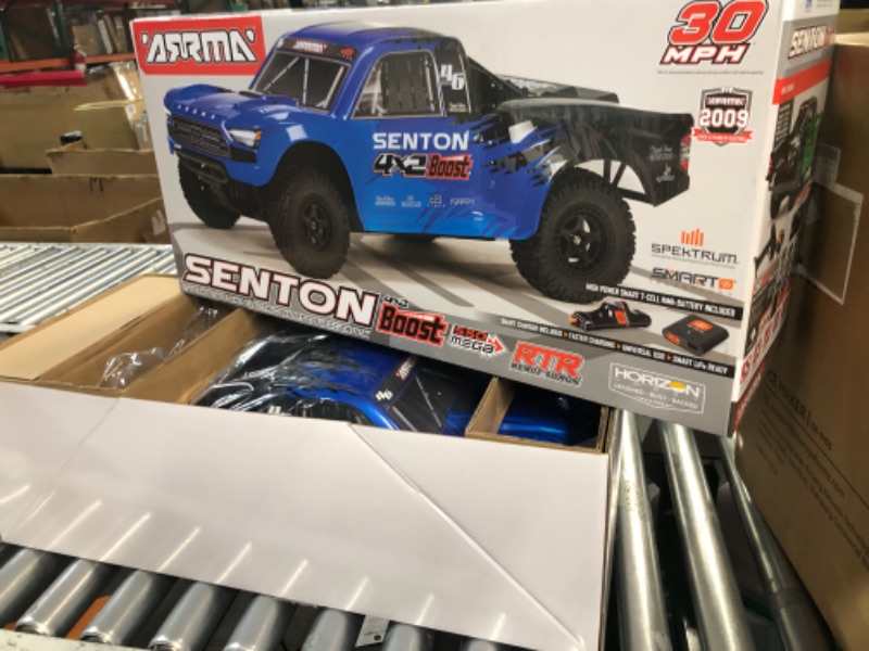 Photo 2 of ARRMA RC Truck 1/10 SENTON 4X2 Boost MEGA 550 Brushed Short Course Truck RTR with Battery & Charger, Blue, ARA4103SV4T2