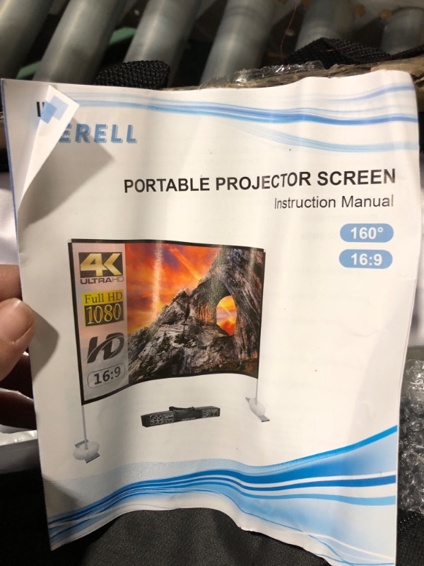 Photo 4 of ***SCREEN ONLY - NO PROJECTOR - USED - LIKELY MISSING PARTS - UNABLE TO VERIFY FUNCTIONALITY***
Projector Screen with Stand, 100 Inch, Black, Carrying Case