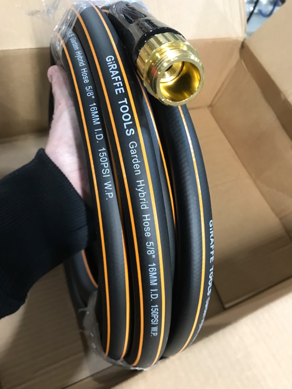 Photo 2 of Giraffe Tools Garden Hose 25 ft, Heavy Duty Black Garden Hose 5/8 in., Rubber Water Hose, No-Kink, Leakroof Gardening Hose with Male to Female Fittings, Black and Orange
