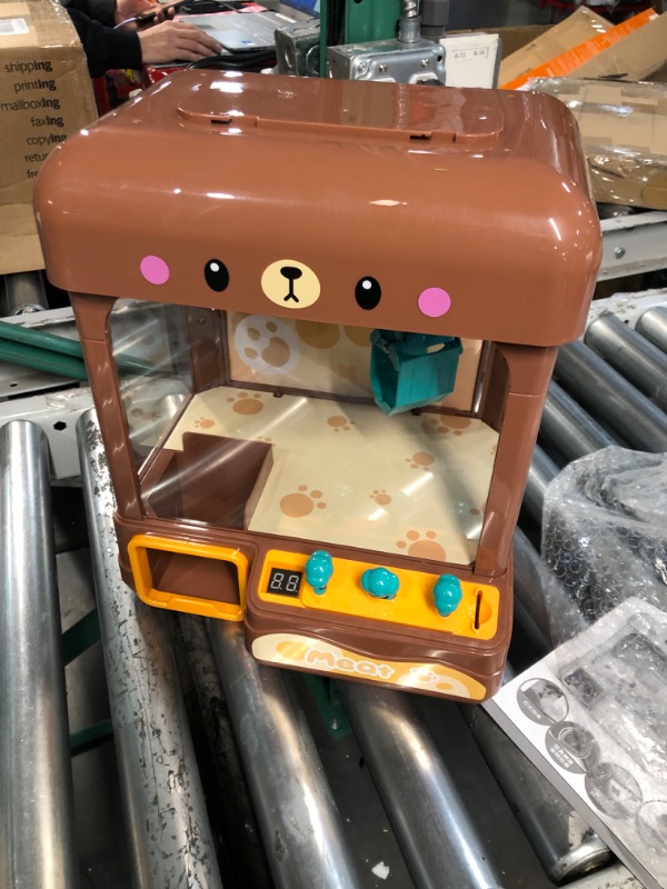 Photo 2 of cxjoigxi Mini Claw Machine for Kids Adults with Prizes,Volume Control and 60 Seconds Countdown,2 Power Supply Modes, Gumball Candy Vending Machines