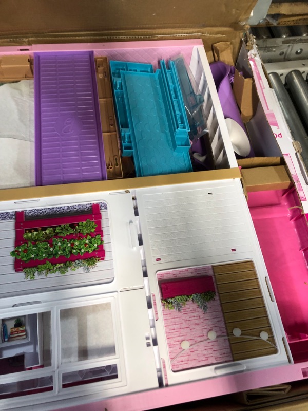 Photo 1 of Barbie Dreamhouse, Doll House Playset with 70+ Accessories Including Transforming Furniture, Elevator,