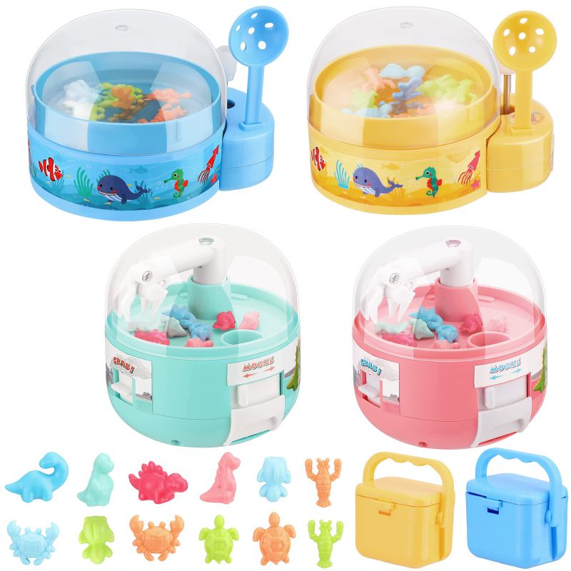 Photo 1 of 4 Sets Mini Dinosaur Claw Machine Toy Fish Catcher Stuff Toy Kid Prize Favor Handheld Tiny Toy with Figures Sea Creature Miniature Novelty Catcher Storage Box Birthday Carnival Party Game Gift 2pack