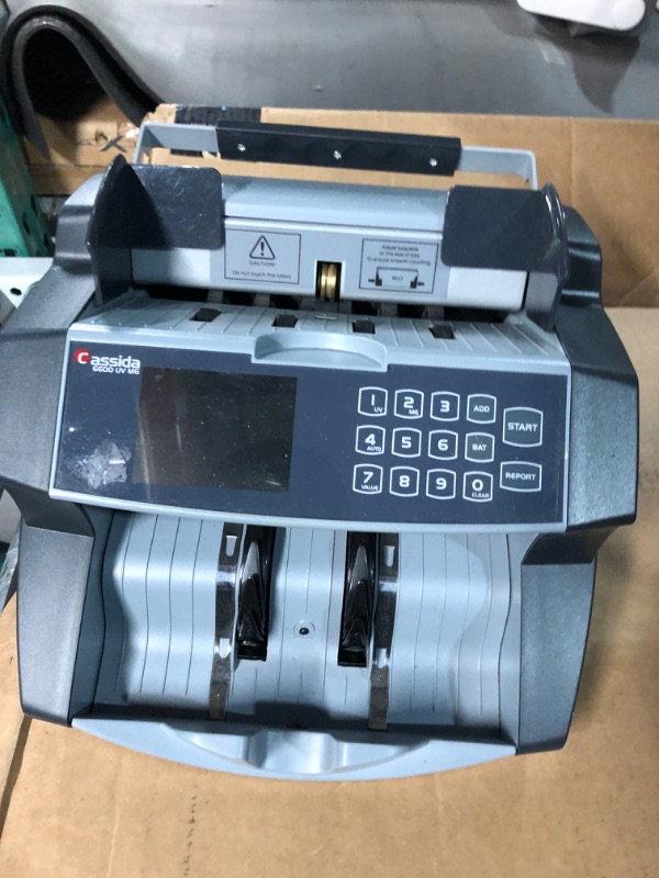 Photo 1 of Cassida 6600 UV/MG – USA Business Grade Money Counter with UV/MG/IR Counterfeit Detection – Top Loading Bill Counting Machine w/ ValuCount™, Add and Batch Modes – Fast Counting Speed 1,400 Notes/Min UV/MG Counterfeit Detection Machine