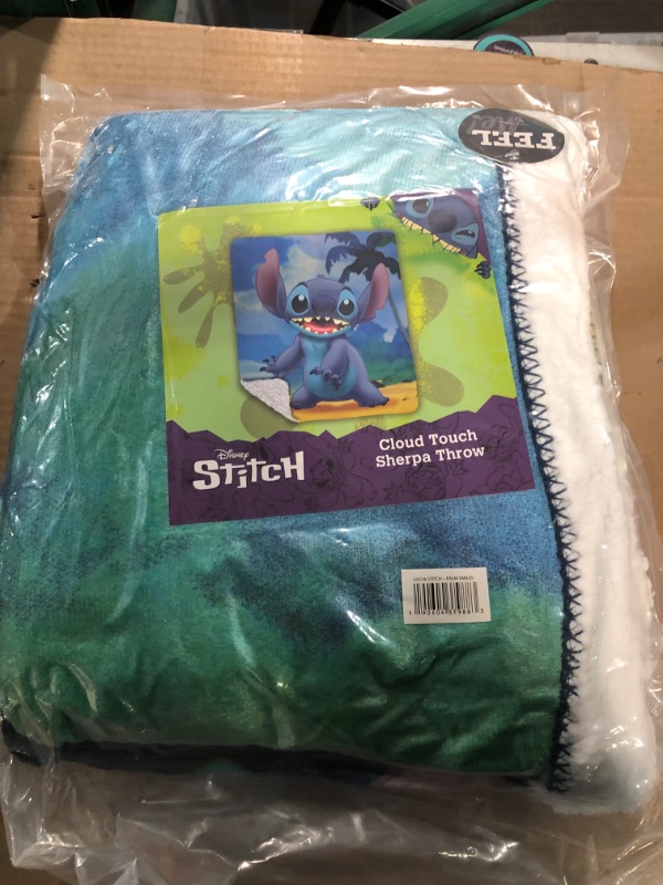 Photo 2 of Lilo & Stitch "Palm Smiles" Cloud Sherpa Throw Blanket, 50" x 60"