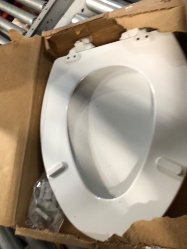 Photo 3 of **MISSING MIDDLE SECTION FOR POTTY TRAINING-MINOR SCRATCH**
MAYFAIR 1888SLOW 000 NextStep2 Toilet Seat with Built-In Potty Training Seat, Slow-Close, 