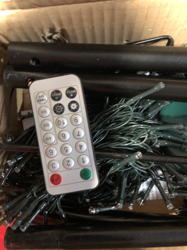 Photo 3 of * used * unknown if incomplete * 
Lomotech Christmas Tree Lights, 404 LED 10Ft Dynamic Cascading Iron Pole Lights with 16 Stands and 7.08" Star Top,