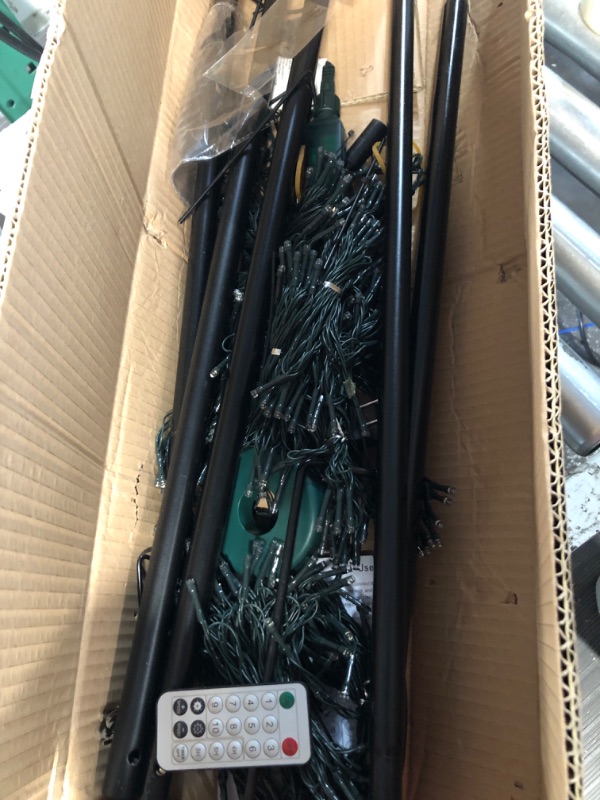 Photo 2 of * used * unknown if incomplete * 
Lomotech Christmas Tree Lights, 404 LED 10Ft Dynamic Cascading Iron Pole Lights with 16 Stands and 7.08" Star Top,