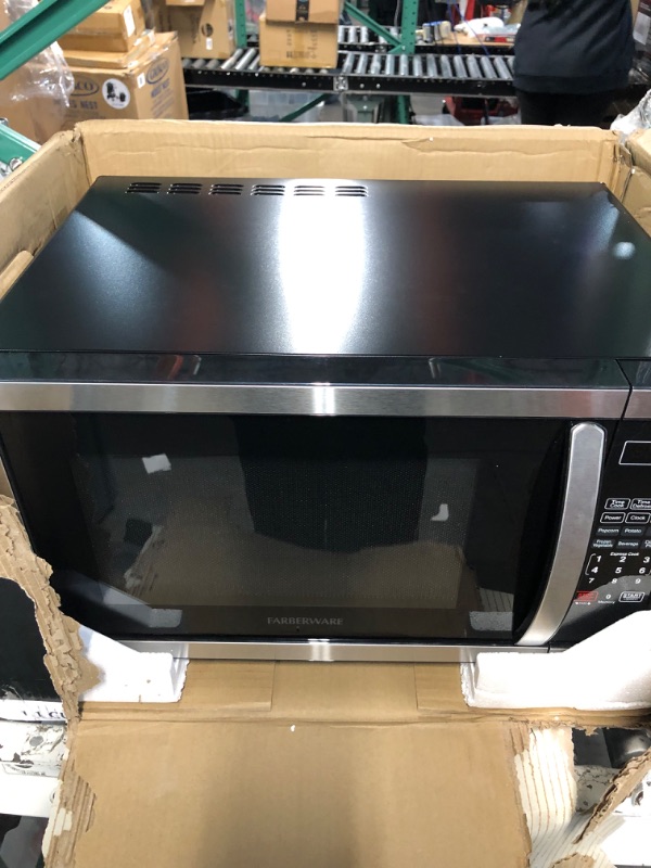 Photo 3 of **NON FUNCTIONAL*FOR PARTS***
Farberware Countertop Microwave 1.1 Cu. Ft. 1000-Watt Compact Microwave Oven with LED lighting