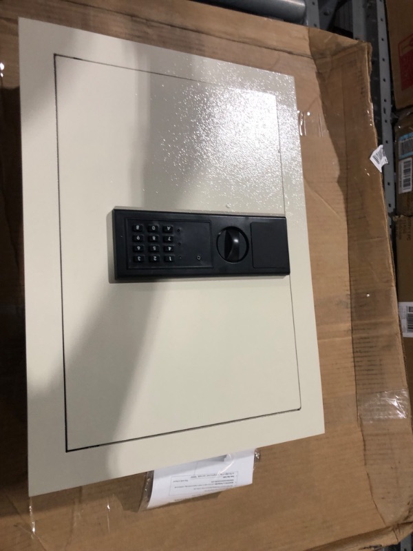 Photo 3 of **DOES NOT FUNCTION SEE NOTES**
PARAGON SAFES Electronic Flat Wall Safe Box with Digital Keypad and 2 Manual Override 