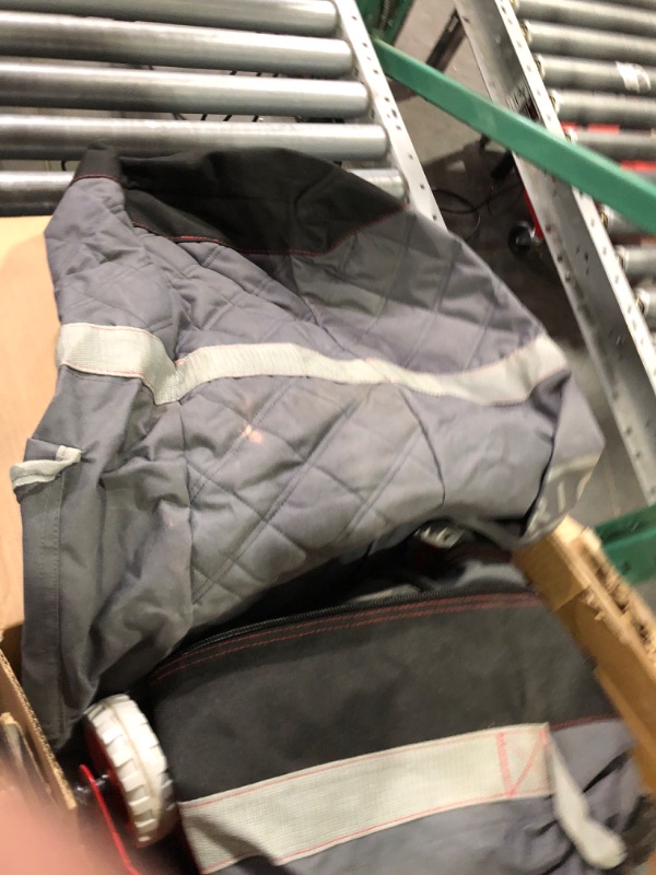 Photo 1 of **USED/DIRTY**
E-Z Up Deluxe Wide-Trax Roller Bag