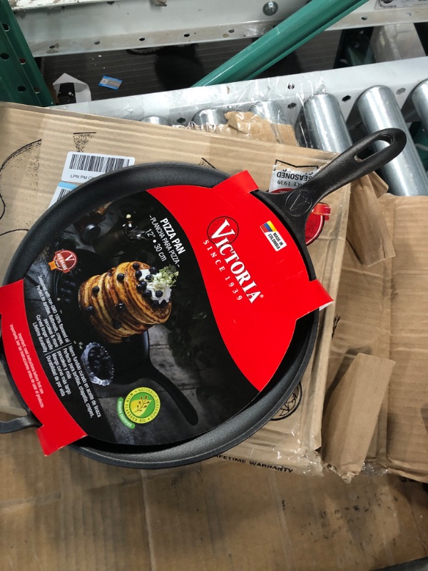 Photo 1 of Victoria 12-Inch Cast-Iron Comal Pizza Pan with a Long Handle and a Loop Handle, Preseasoned with Flaxseed Oil, Made in Colombia 12 Inch