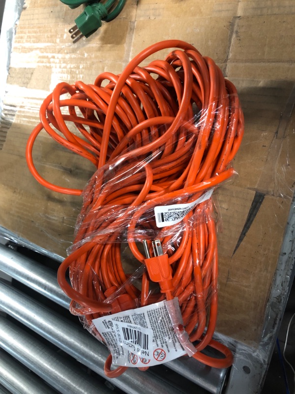 Photo 2 of *TESTED AND FUNCTIONAL*
eavy Duty Outdoor vinyl Power Extension Cord SJTW, Orange, 16/3, 100 FT.