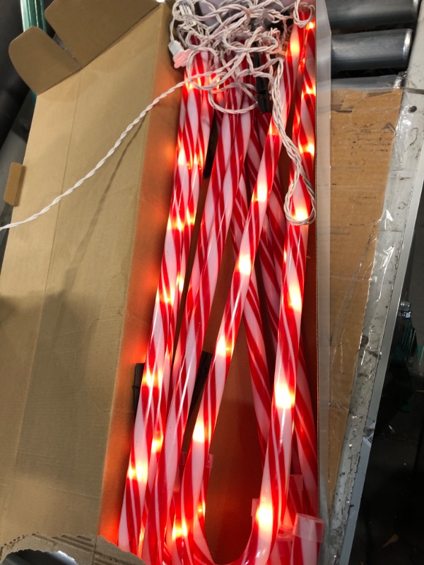 Photo 2 of * used * incomplete * 
Joiedomi 28" Christmas Candy Cane Pathway Markers Lights, 12 Sets Christmas Pinstripe Pathway Lights with 54 Warm White Lights 