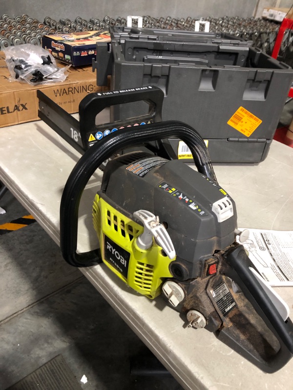 Photo 2 of * used * see all images * 
RYOBI gas chain saw 