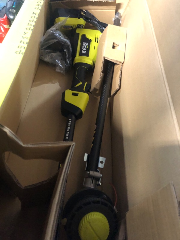 Photo 4 of **MISSING TRIMMER SHIELD AND HANDLE****
RYOBI 40V HP Brushless 600 CFM 155 MPH Cordless Leaf Blower and Carbon Fiber String Trimmer with 4.0 Ah Battery and Charger