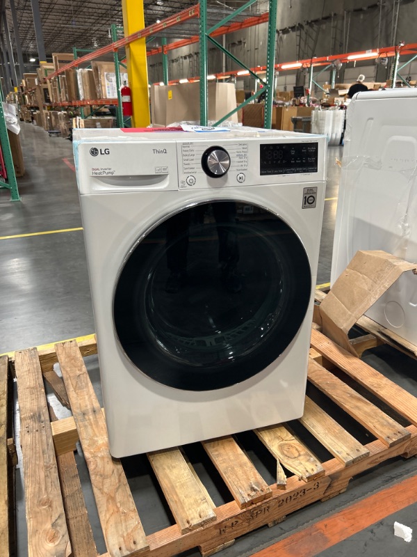 Photo 2 of ***USED - DENTED/SCRATCHED - UNABLE TO TEST***
LG 24 in. W 4.2 Cu. Ft. Ventless Stackable Compact SMART Electric Dryer in White with Dual Inverter HeatPump Technology