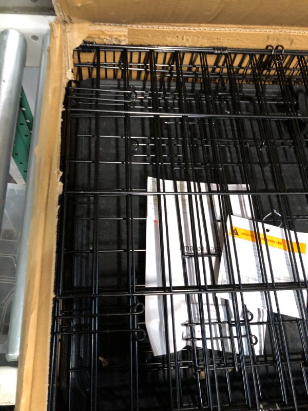 Photo 1 of Amazon Basics Foldable Metal Wire Dog Crate with Tray, Single Door, 24 Inch 24" Single Door w/ Divider Crate