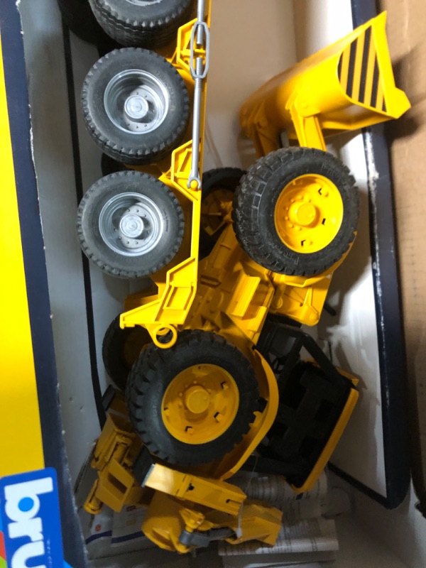 Photo 2 of Bruder Toys Man TGA Low Loader Truck With JCB Backhoe Loader