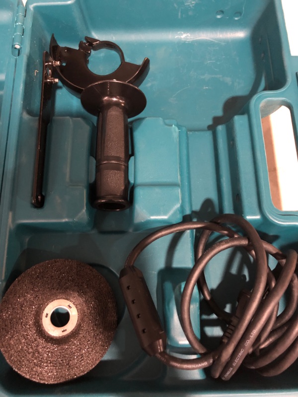 Photo 4 of **NON FUNCTIONAL**FOR PARTS ONLY**
Makita GA4030K 4" Angle Grinder, with tool case, Teal