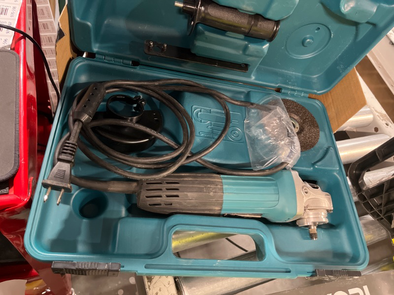 Photo 2 of **NON FUNCTIONAL**FOR PARTS ONLY**
Makita GA4030K 4" Angle Grinder, with tool case, Teal