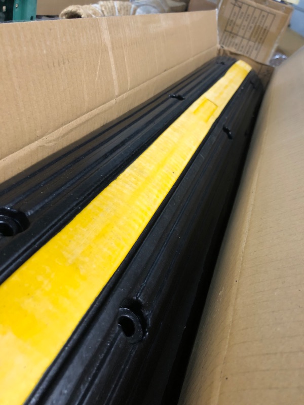 Photo 2 of Reliancer 4 Pack 1-Channel Rubber Cable Protector Ramp Traffic Speed Bump 18000lbs Capacity Heavy Duty Cable Protective Cover Ramp 