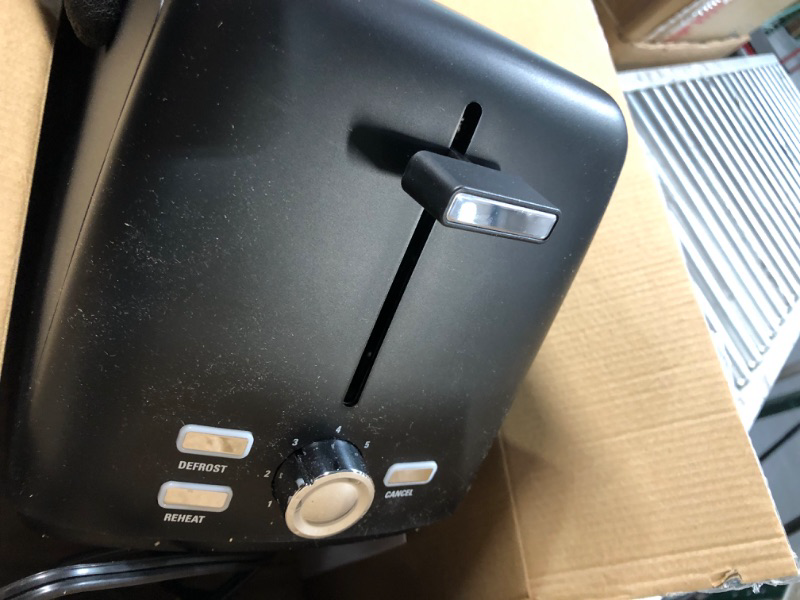 Photo 4 of * used * functional * 
BELLA 4 Slice Long Slot Toaster, Stainless Steel and Black Stainless Steel & Black