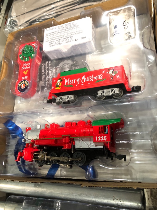 Photo 2 of Lionel Disney Christmas LionChief 0-8-0 Set with Bluetooth Capability, Electric O Gauge Model Train Set with Remote