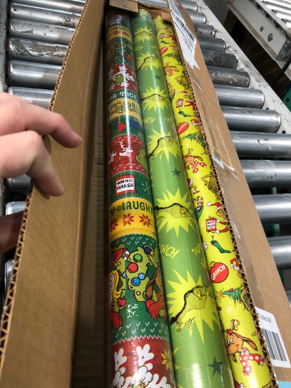 Photo 2 of American Greetings Christmas Wrapping Paper with Cut Lines Bundle, The Grinch (3 Rolls, 105 sq. ft.)