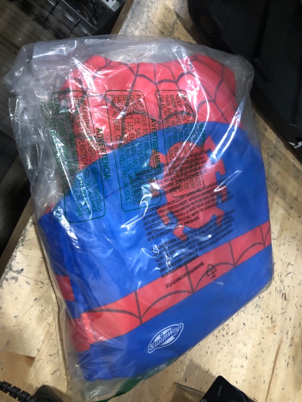 Photo 2 of SwimWays Marvel Swim Trainer Life Jacket, US Coast Guard Approved Life Vest Kids Swim Vest, Pool Floats & Life Jackets for Kids 33-55 lbs, Spidey