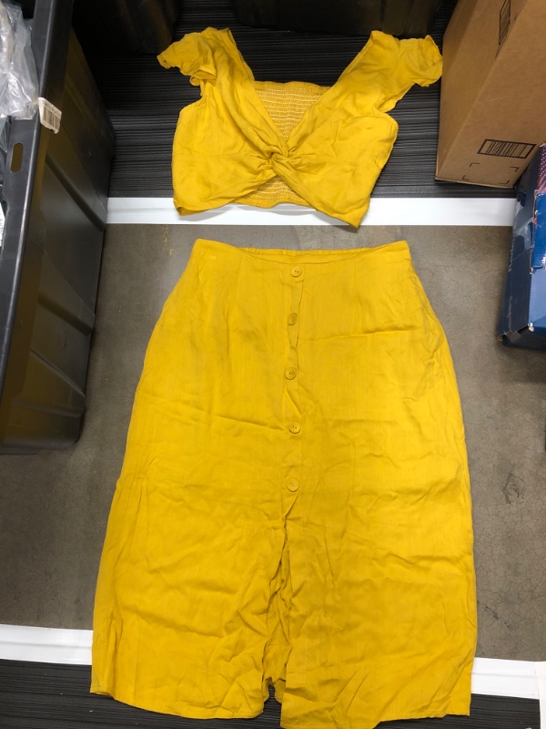 Photo 1 of 2 piece yellow skirt and top size s/m