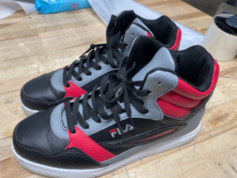 Photo 1 of Fila high tops size 7