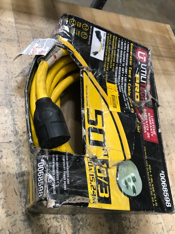 Photo 1 of 50' yellow extension cord 