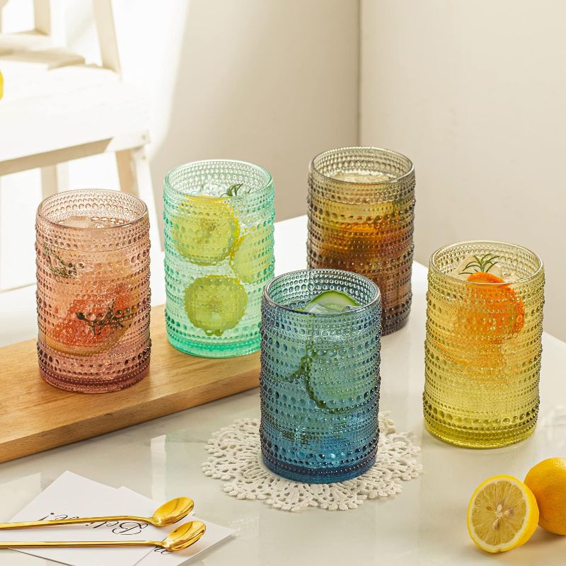 Photo 1 of 12 drinking glasses multi colored small and large
