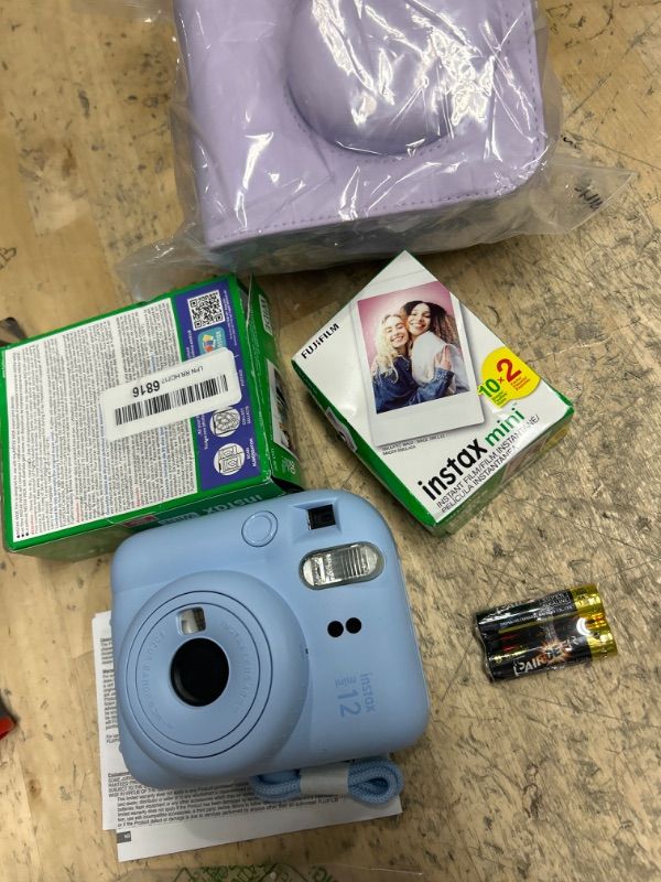 Photo 2 of Fujifilm Instax Mini 12 Instant Camera with Case, 20 Fujifilm Prints, Decoration Stickers, Frames, Photo Album and More Acessories (Pastel Blue)