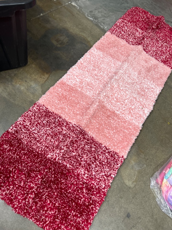 Photo 1 of 60X20 RED WHITE AND PINK BATH MAT