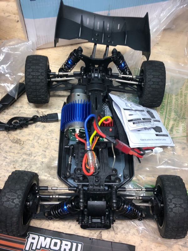 Photo 6 of **UNABLET TO TEST, CONTROLLER REQUIRES 3 DOUBLE A BATTERIES**
AMORIL 1:14 Fast RC Cars for Adults,Top Speed 70+KMH,Hobby Remote Control Car,4X4 Large Truck Off-Road Racing Buggy,Electric Vehicle Toy Gift for Kids with Oil-Filled Shocks,Upgraded Metal Part