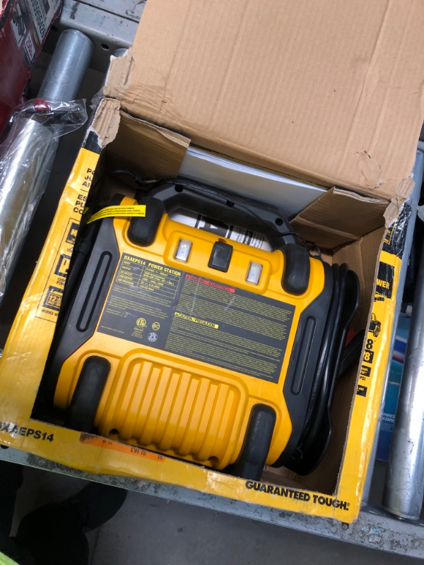 Photo 2 of DEWALT DXAEPS14 1600 Peak Battery Amp 12V Automotive Jump Starter/Power Station with 500 Watt AC Power Inverter, 120 PSI Digital Compressor, and USB Power , Yellow