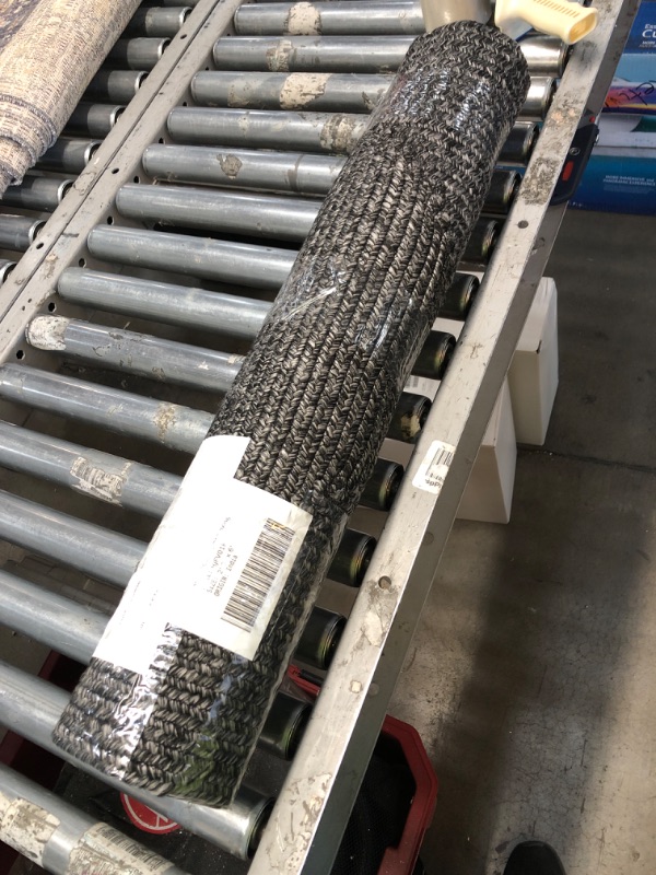 Photo 1 of 2'6 x 6 area rug, black