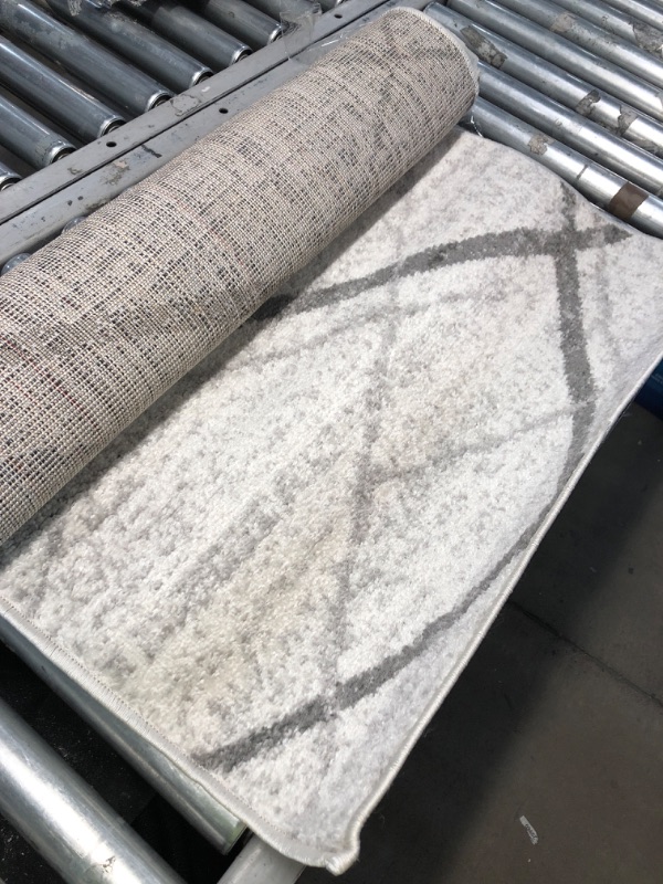 Photo 1 of 2'6 x 10 gray runner 
