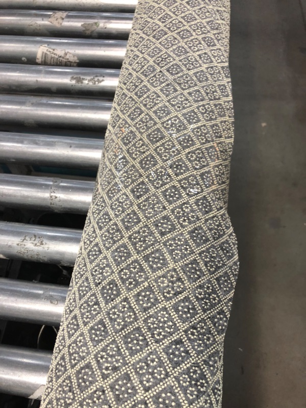 Photo 1 of 8ft round gray rug 