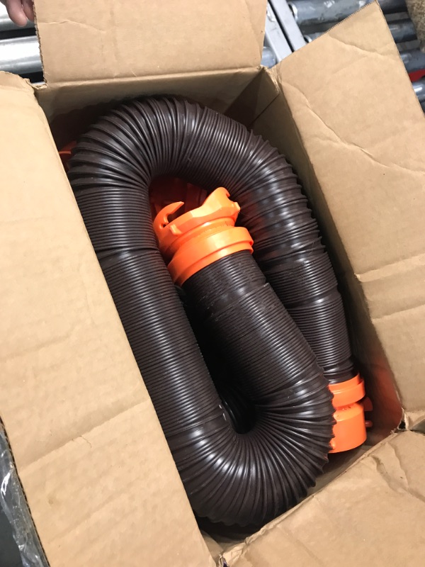 Photo 2 of Camco 20' (39742) RhinoFLEX 20-Foot RV Sewer Hose Kit, Swivel Transparent Elbow with 4-in-1 Dump Station Fitting-Storage Caps Included , Black , Brown 20ft Sewer Hose Kit Frustration-Free Packaging