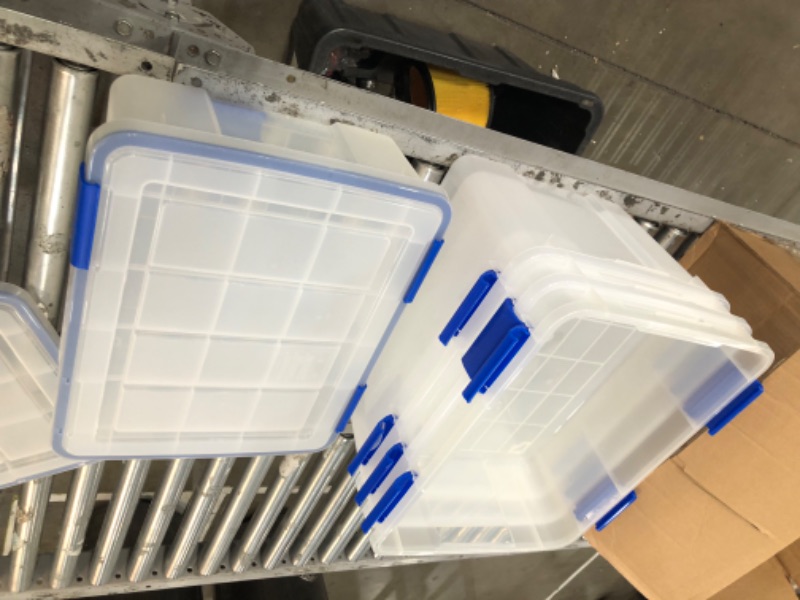 Photo 4 of **DAMAGE**IRIS USA 26.5 & 44 Quart Combo WEATHERPRO Plastic Storage Box with Durable Lid and Seal and Secure Latching Buckles, Clear With Blue Buckles, Weathertight, 4 Pack 26.5 & 44 Quart Combo - 4 Pack