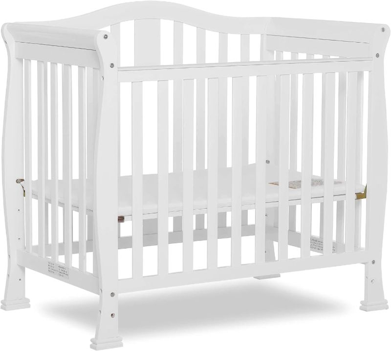 Photo 1 of Dream On Me Addison 4-In-1 Convertible Mini Crib In White, Greenguard Gold Certified, Non-Toxic Finishes, Built Of New Zealand Pinewood, Comes With 1 Mattress Pad White Inch (Pack of 1)
